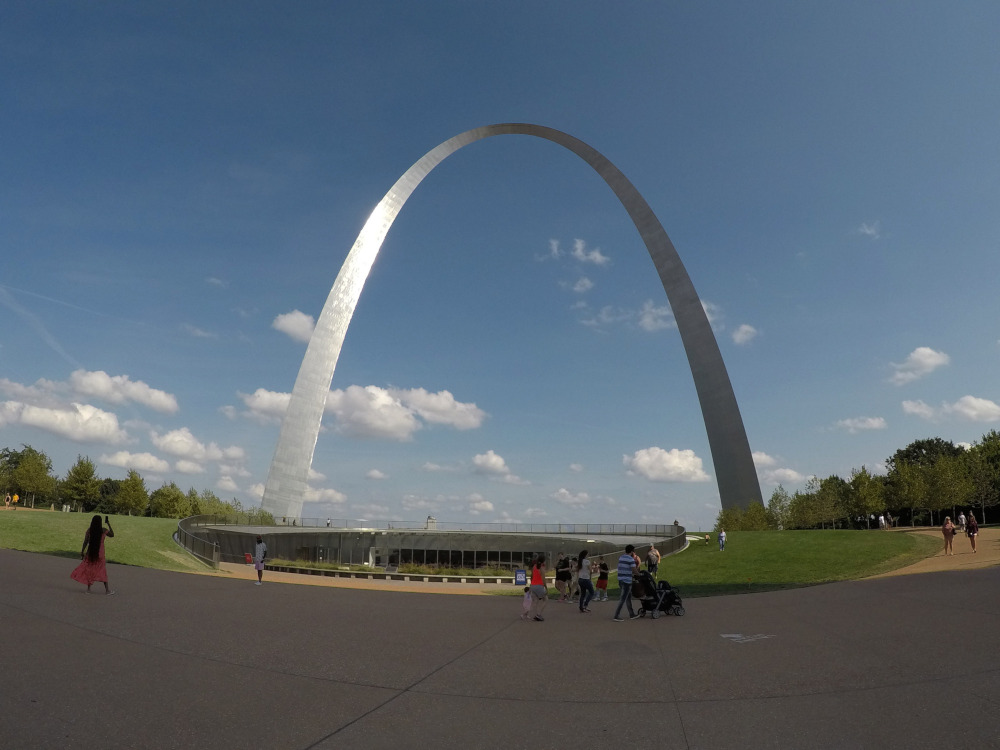 Shade falls on the walk in front of the west entrance into the Gateway Arch.